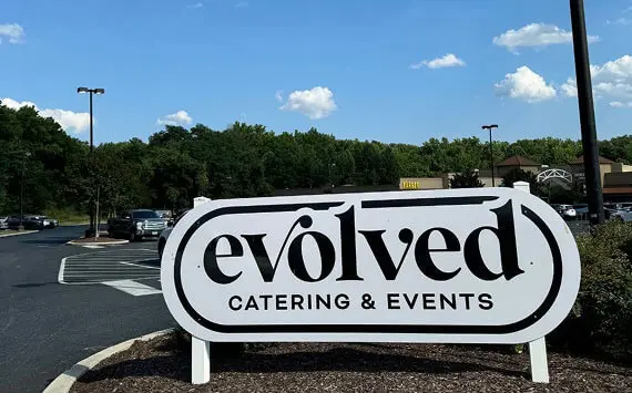 Evolved Catering outdoor sign