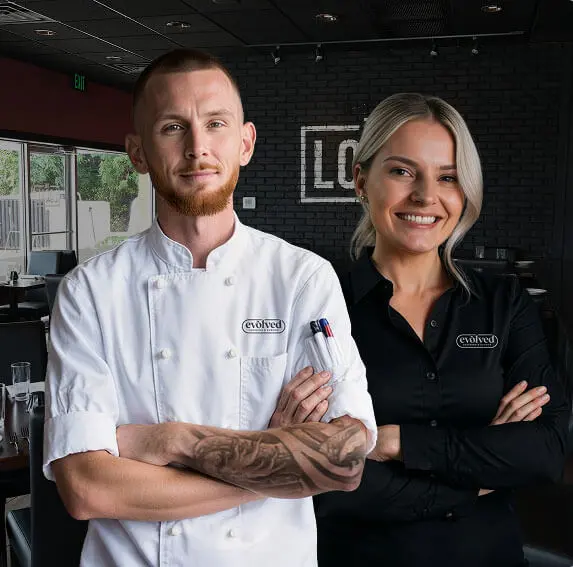 A professional caterer in Baltimore, MD, arranging a fresh food display for a local event.