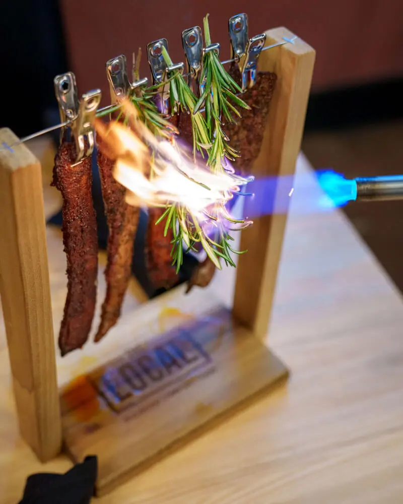 Flaming lamb chops display