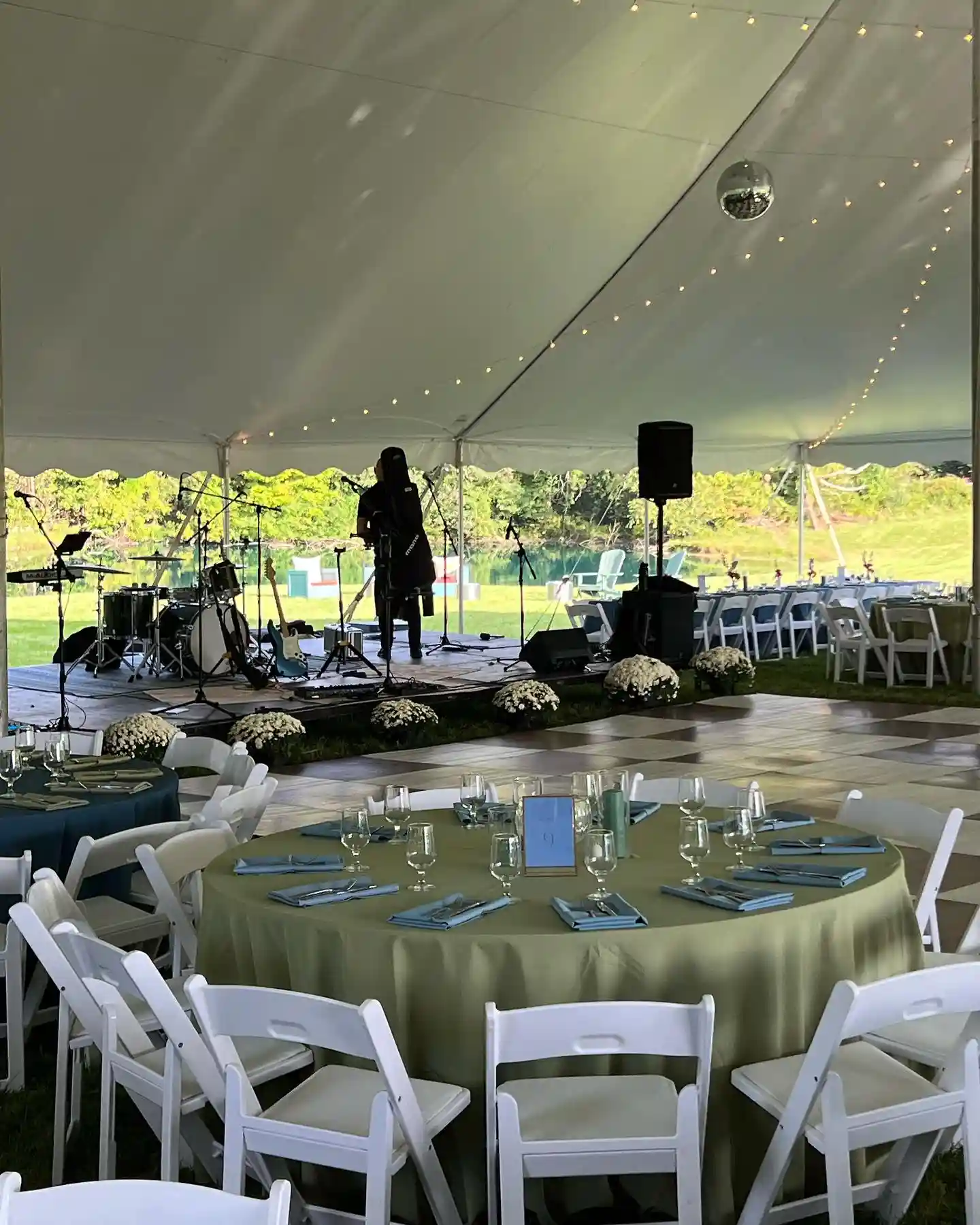 Elegant wedding venue in Fallston, MD prepared with floral arrangements and seating for guests.