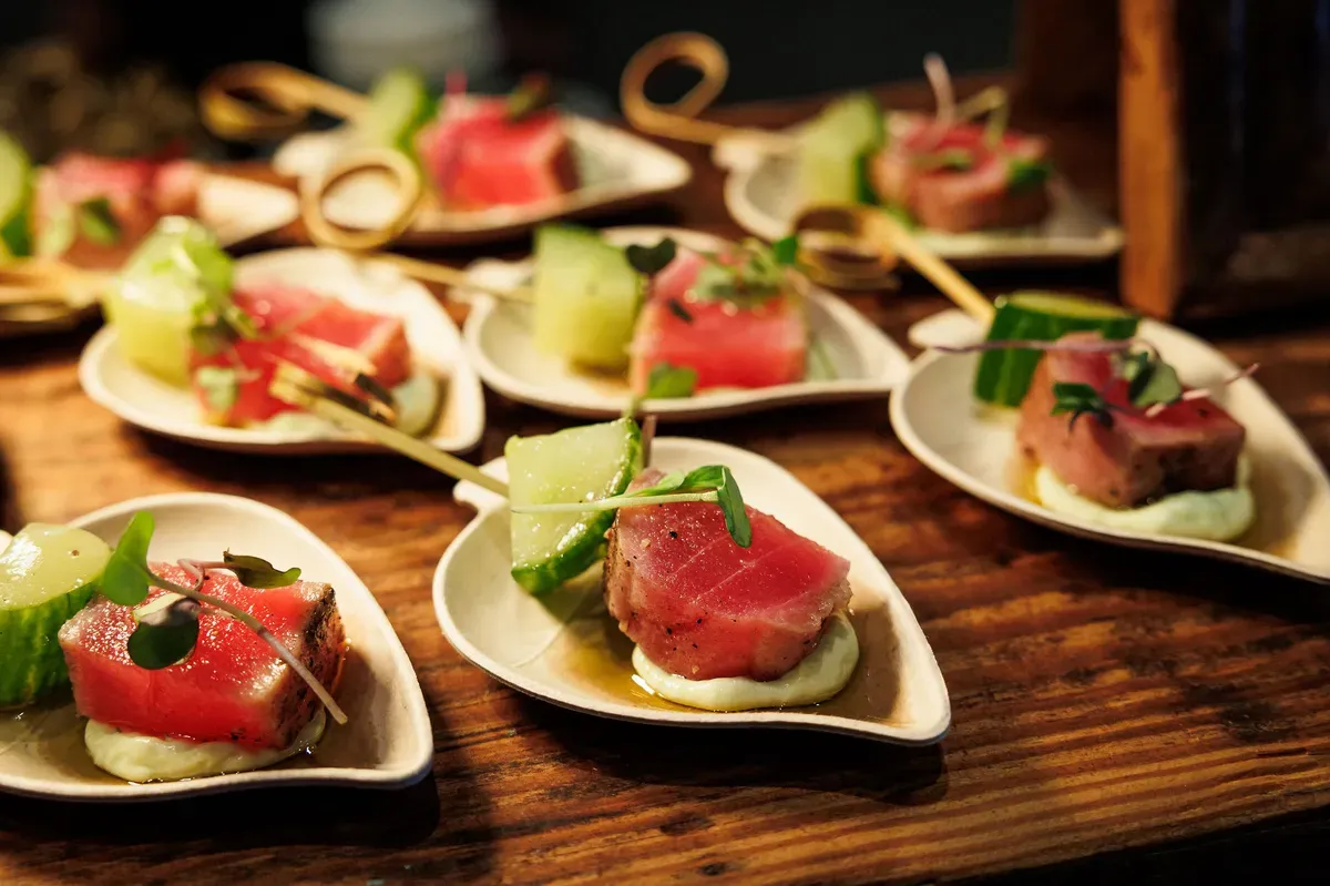 Seared tuna canapes plated on individual serving dishes. Catering in Downtown Baltimore.