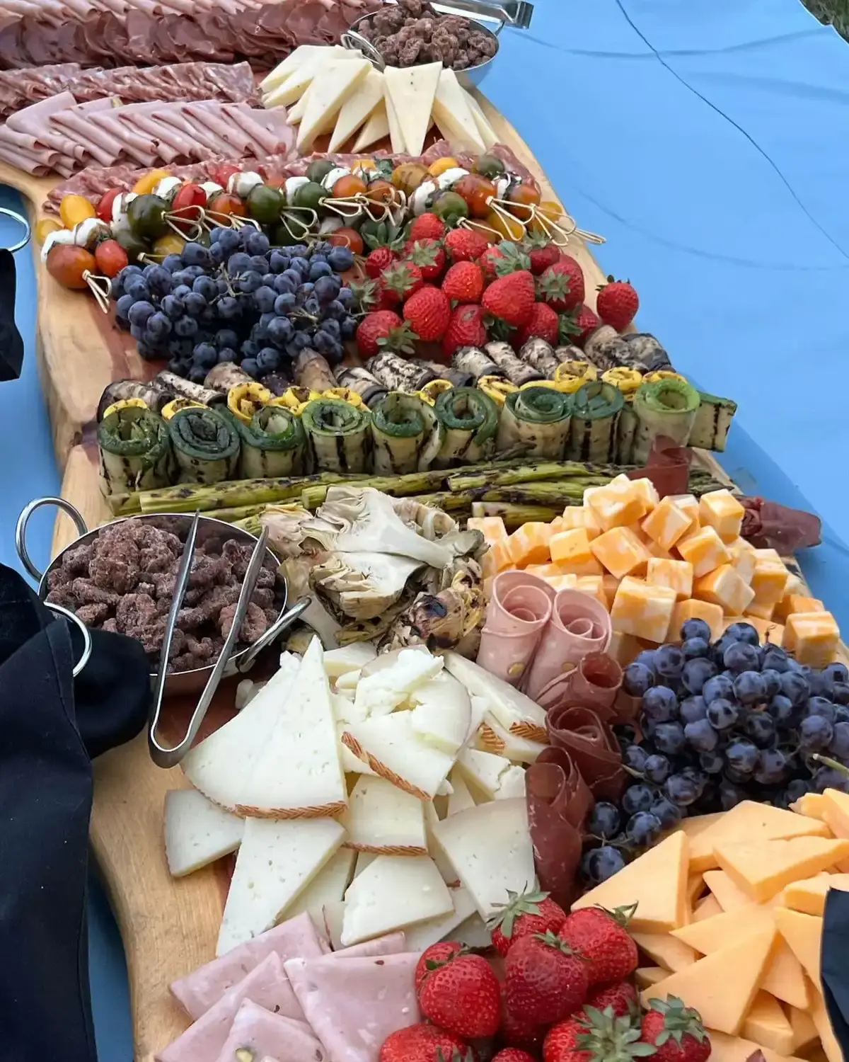 Grazing table of deli meats, cheeses and fresh fruit. Catering in Greater Rosemont, Baltimore.