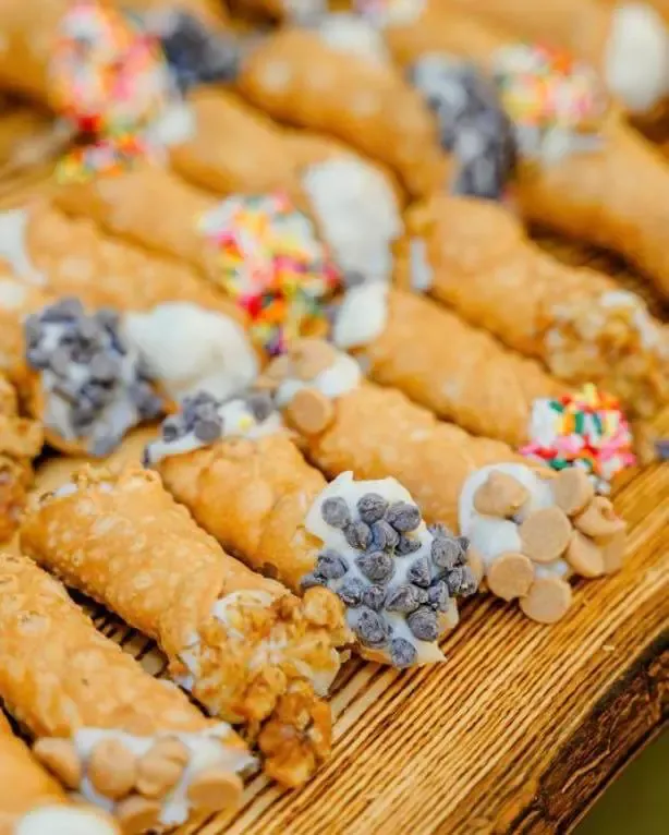 Cannoli pastries with chocolate chip and sprinkle toppings. Catering in Waltherson, Baltimore.