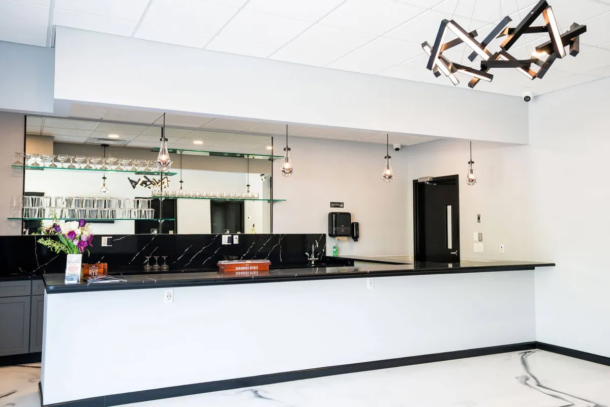 Bright event space with a service counter ready for a catered event in Baltimore