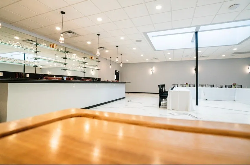 Open event space with a long counter and room for food stations in Baltimore