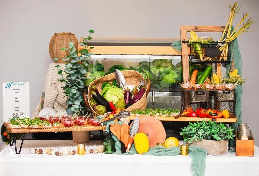 Food station display with fresh produce set against the wall in Baltimore